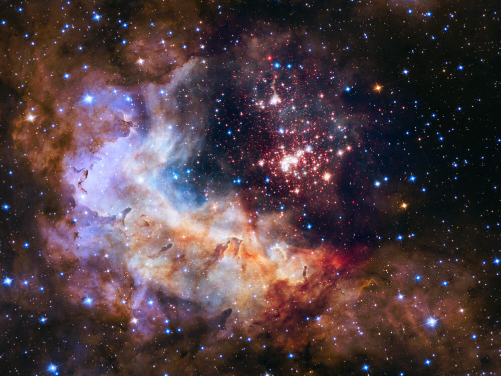 Stars and cloud like formations in space.
