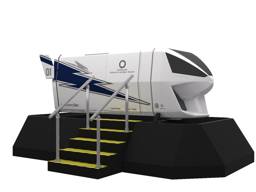 A white capsule with a lightening bolt on the side. It sits on a platform and stairs lead up to the door.