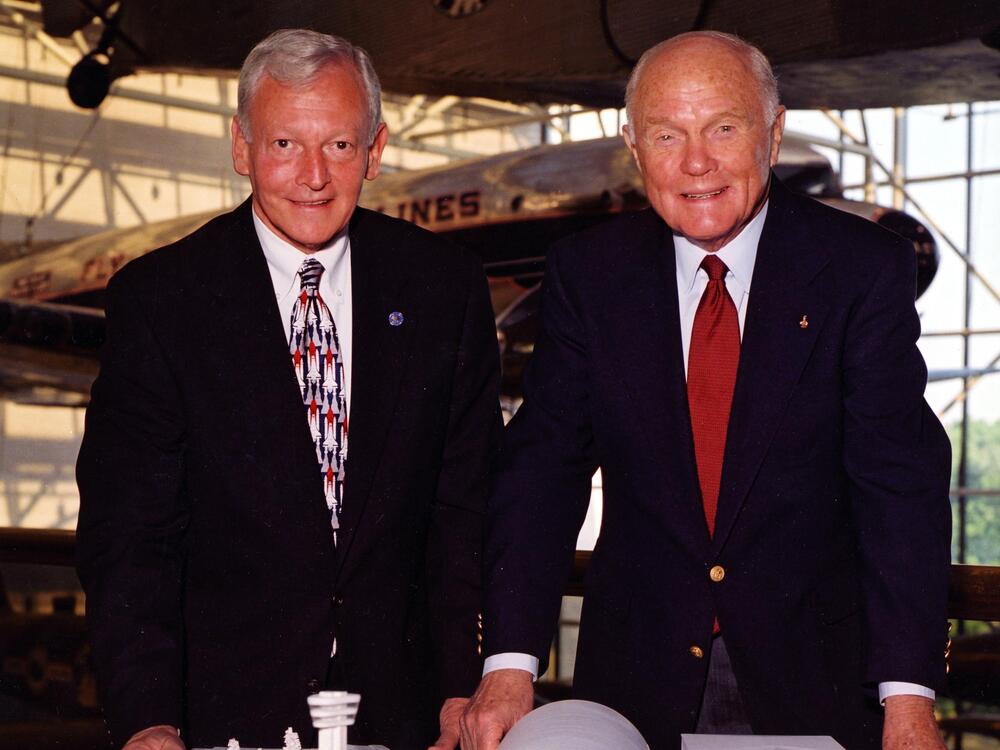 Senator John Glenn (right) and General J.R. Dailey (left) stand together with a model of the soon-to-be-built Steven F. Udvar-Hazy Center.